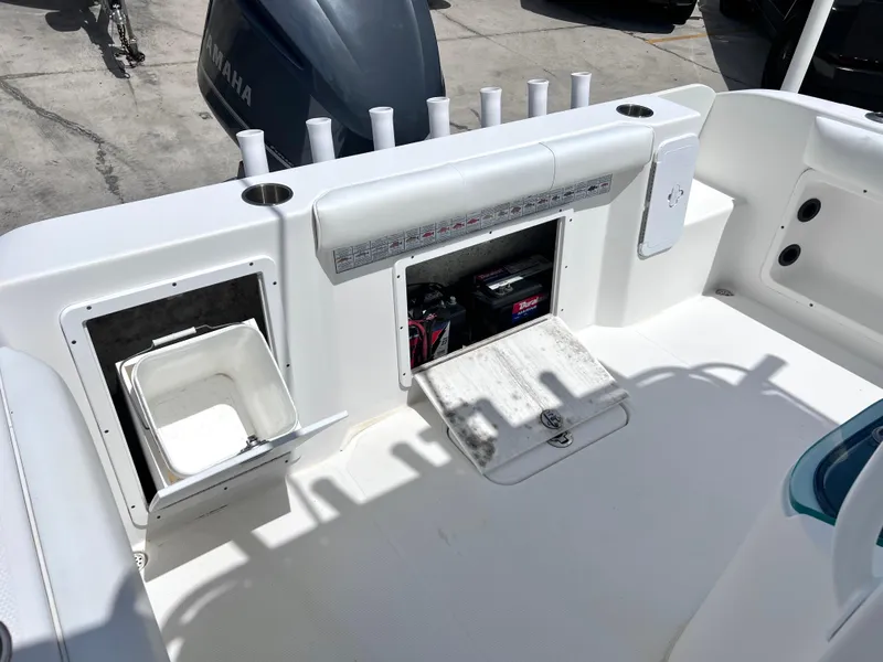 Slide: The Image of 2017 Cape Horn 22 OS boat deck with storage compartments and rod holders. - 26