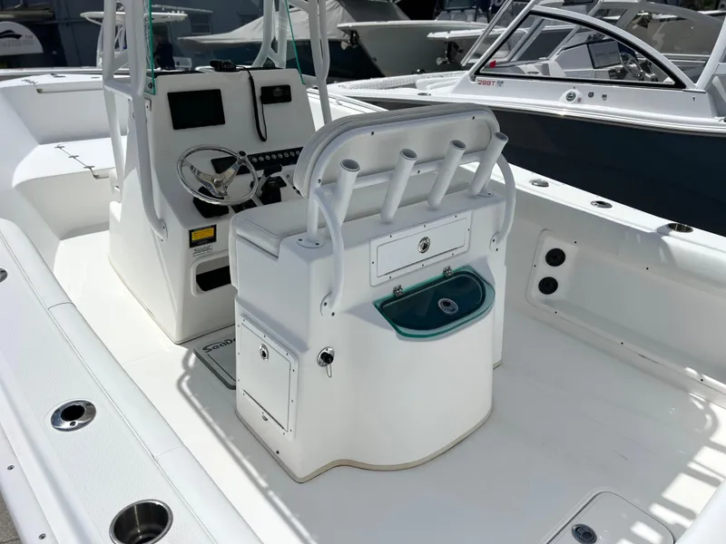 Slide: The Image of 2017 Cape Horn 22 OS boat interior with helm and seating area. - 28