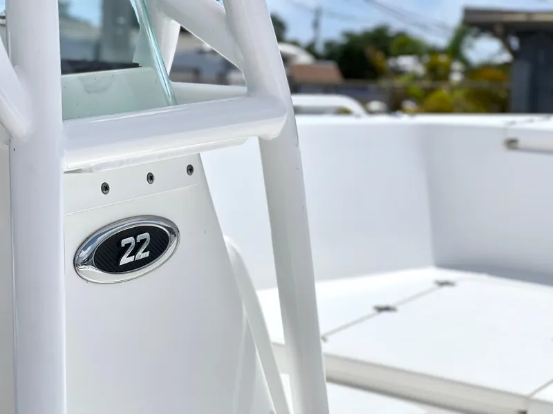 Slide: The Image of 2017 Cape Horn 22 OS boat, close-up of console and deck in sunlight. - 34