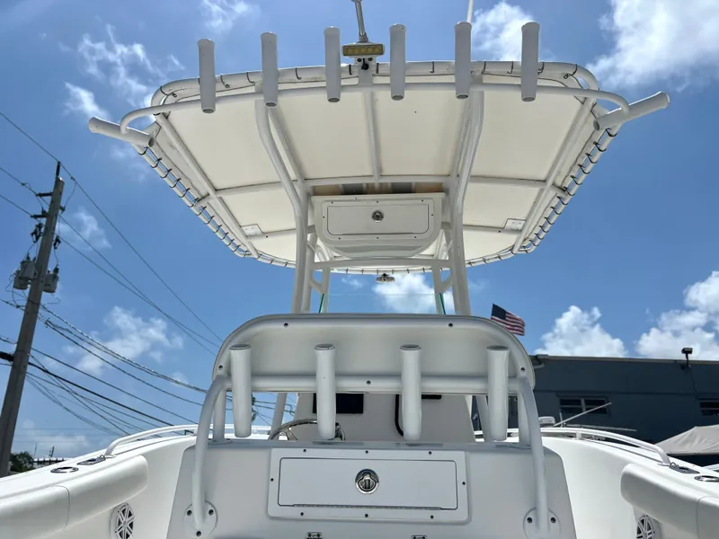Slide: The Image of 2017 Cape Horn 22 OS boat with T-top under a clear blue sky. - 37