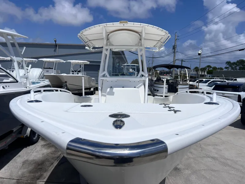 Slide: The Image of 2017 Cape Horn 22 OS boat with Yamaha 300 HP engine, docked outdoors. - 6