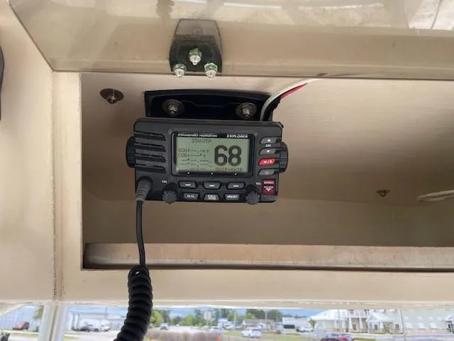 Slide: The Image of Marine radio installed in a 2013 Parker 21 SE boat, displaying channel 68. - 14