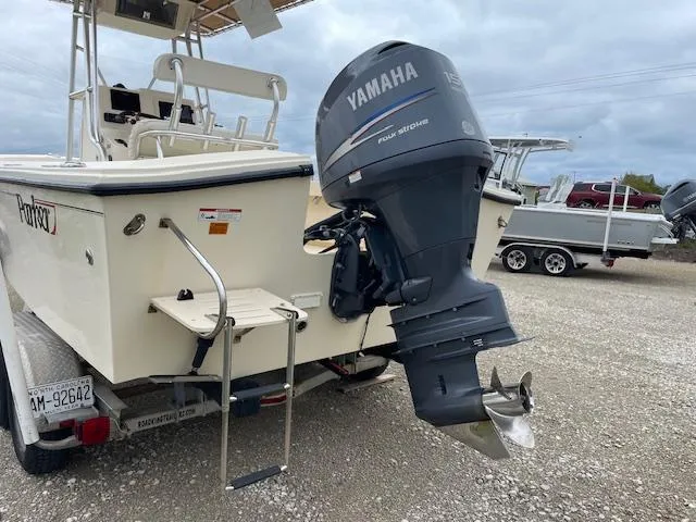 Slide: The Image of Parker 21 SE boat with Yamaha outboard motor, 2013 model, on a trailer. - 5