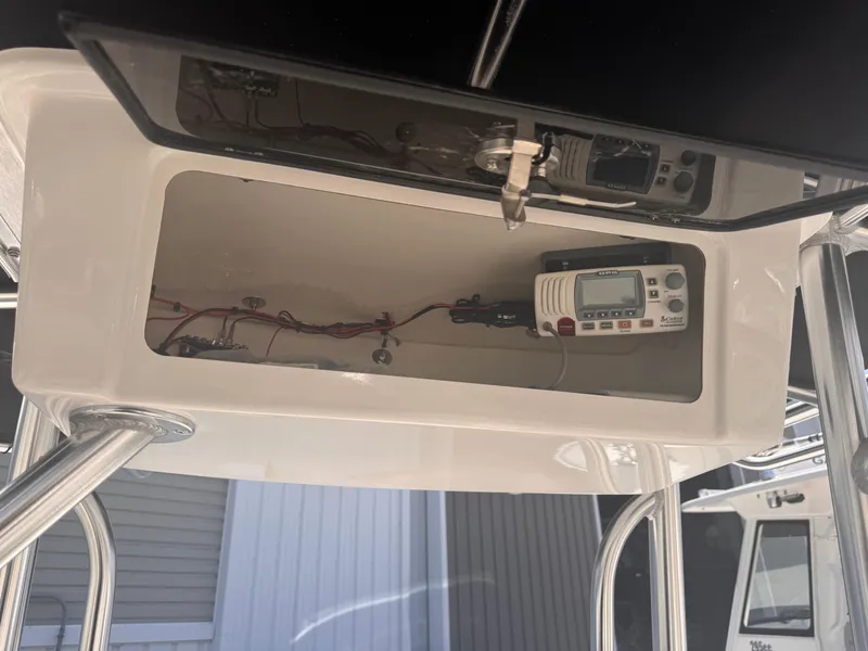 Slide: The Image of 2024 Carolina Skiff 21 LS boat console with GPS system and wiring. - 13