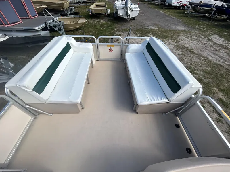 Slide: The Image of 2004 Godfrey Tuscany 220 pontoon boat with spacious seating area. - 11
