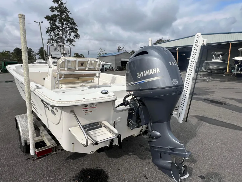 Slide: The Image of 2019 Carolina Skiff 218 DLV boat with Yamaha 115 outboard motor on trailer. - 3