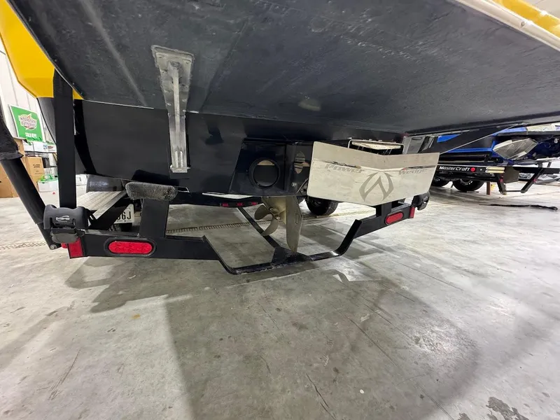 Slide: The Image of 2007 Malibu Sunscape 23 LSV boat trailer, rear view in a garage setting. - 20