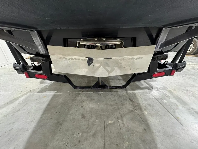 Slide: The Image of Rear view of a 2007 Malibu Sunscape 23 LSV boat with Power Wedge feature. - 21