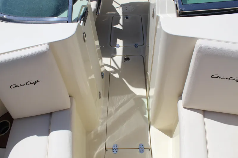 Slide: The Image of 2022 Chris-Craft Launch 27 interior with cream upholstery and sleek design. - 11