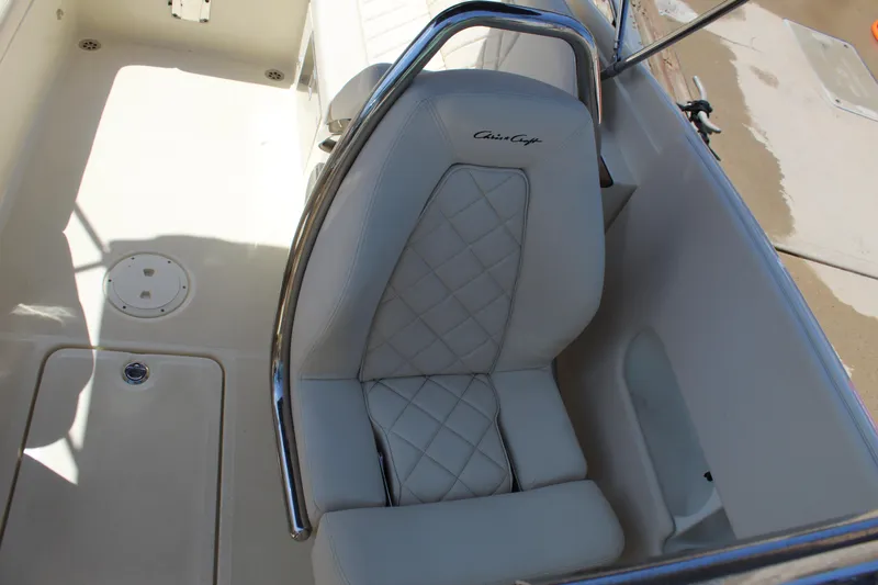 Slide: The Image of Luxurious 2022 Chris-Craft Launch 27 boat seat with elegant diamond stitching and chrome accents. - 19