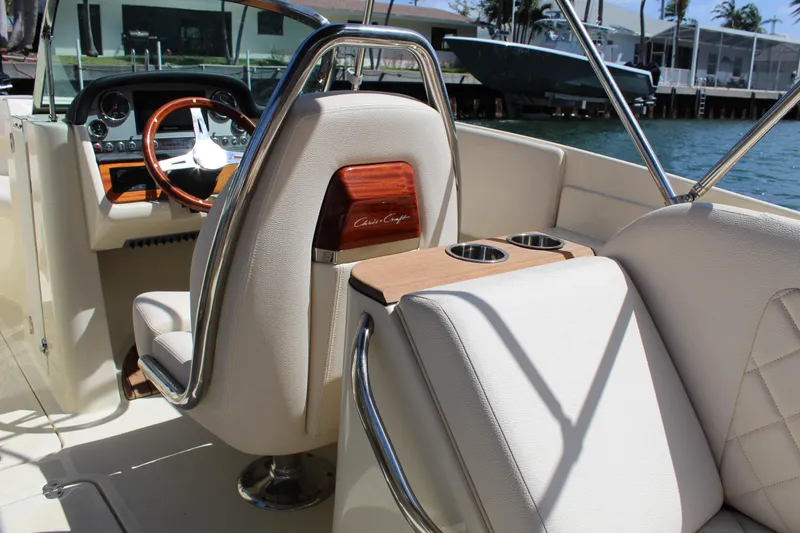 Slide: The Image of 2022 Chris-Craft Launch 27 interior with luxurious seating and elegant dashboard design. - 24