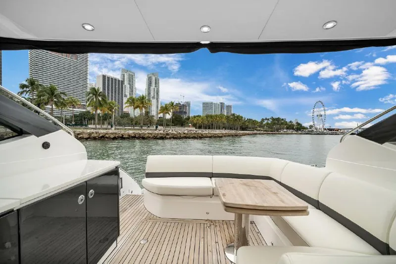 Slide: The Image of Luxurious 2016 Princess V39 yacht interior with city skyline and waterfront view. - 10