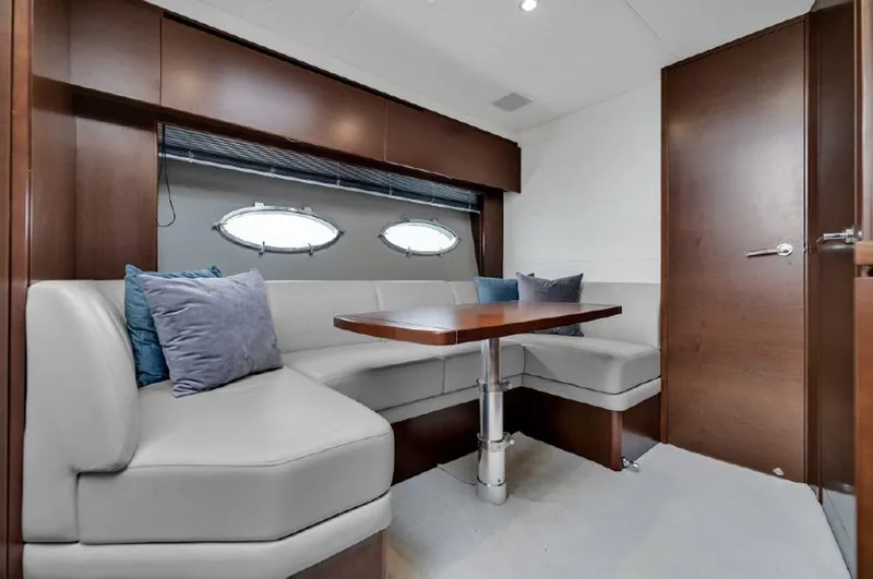 Slide: The Image of Luxurious interior of 2016 Princess V39 yacht with elegant seating and wooden accents. - 15