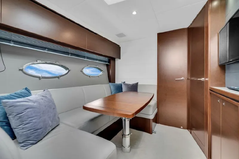 Slide: The Image of Luxurious interior of 2016 Princess V39 yacht with elegant seating and wooden finishes. - 16