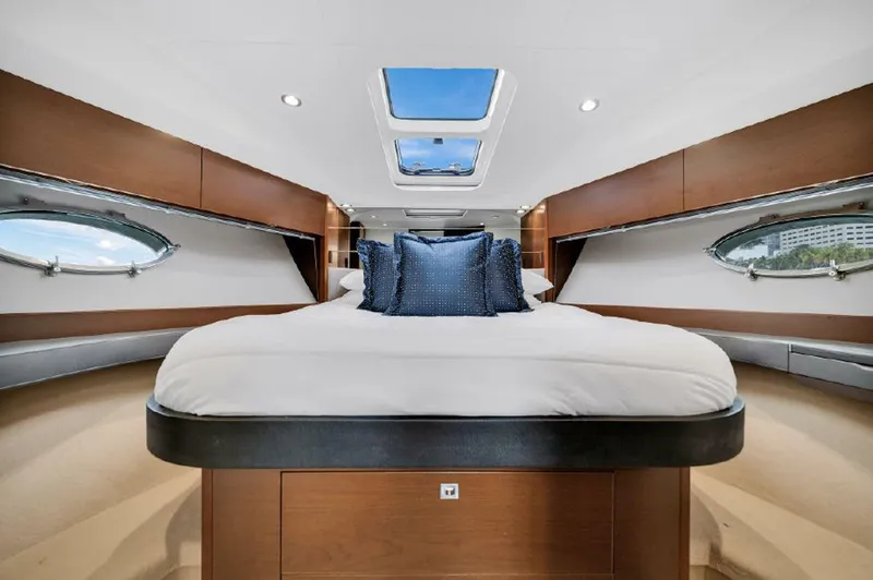 Slide: The Image of Luxurious interior of 2016 Princess V39 yacht with skylight and elegant bedding. - 20