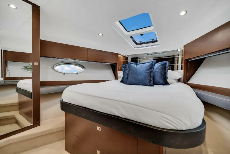 Slide: The Image of Luxurious cabin interior of 2016 Princess V39 yacht with skylight and elegant bedding. - 21
