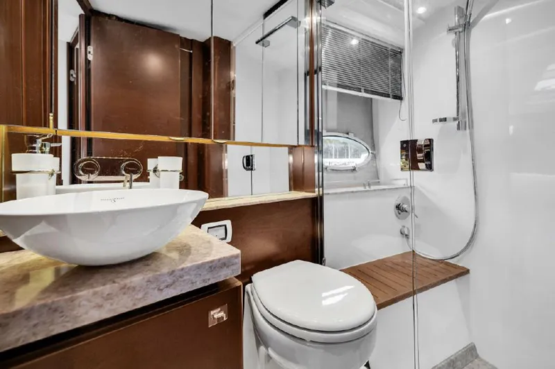 Slide: The Image of Luxurious bathroom in 2016 Princess V39 yacht with modern fixtures and elegant design. - 22