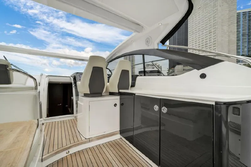Slide: The Image of 2016 Princess V39 yacht interior with sleek design and modern seating. - 4