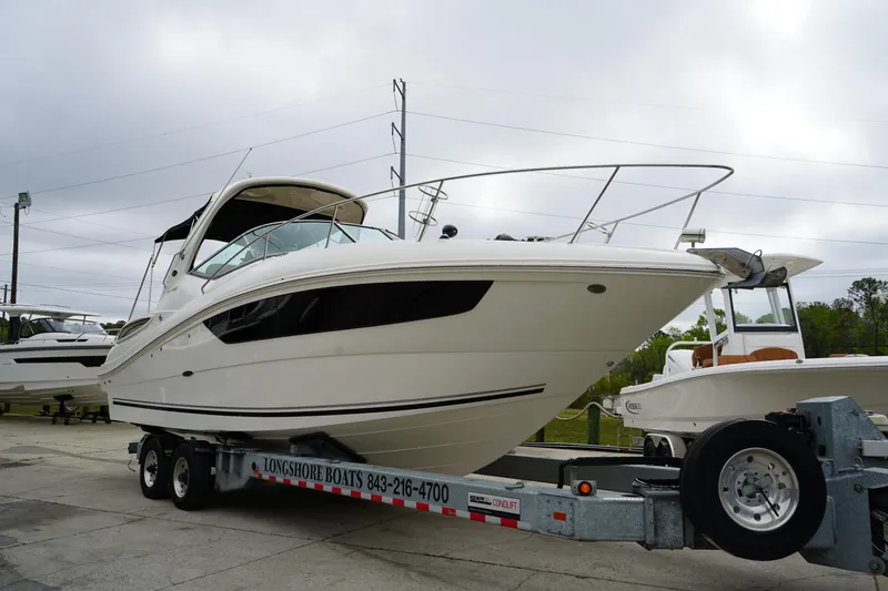 Slide: The Image of 2016 Sea Ray 330 Sundancer boat on trailer, ready for transport. - 0