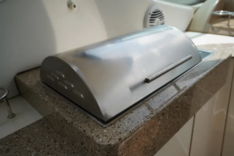 Slide: The Image of Stainless steel grill on 2016 Sea Ray 330 Sundancer boat. - 11