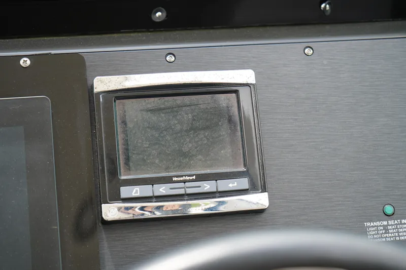 Slide: The Image of Control panel of a 2016 Sea Ray 330 Sundancer boat. - 21