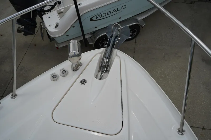 Slide: The Image of Bow of 2016 Sea Ray 330 Sundancer with anchor and railing. - 33