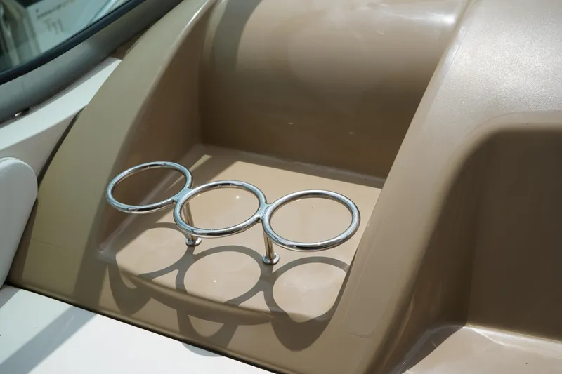 Slide: The Image of Cup holders on 2016 Sea Ray 330 Sundancer boat dashboard. - 9