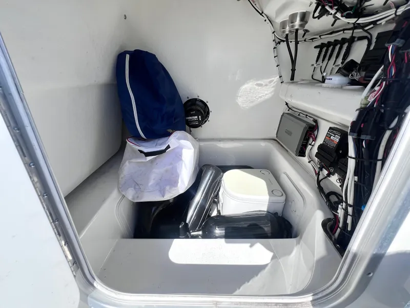 Slide: The Image of 2022 Cape Horn 24 XS boat interior with storage and equipment. - 27