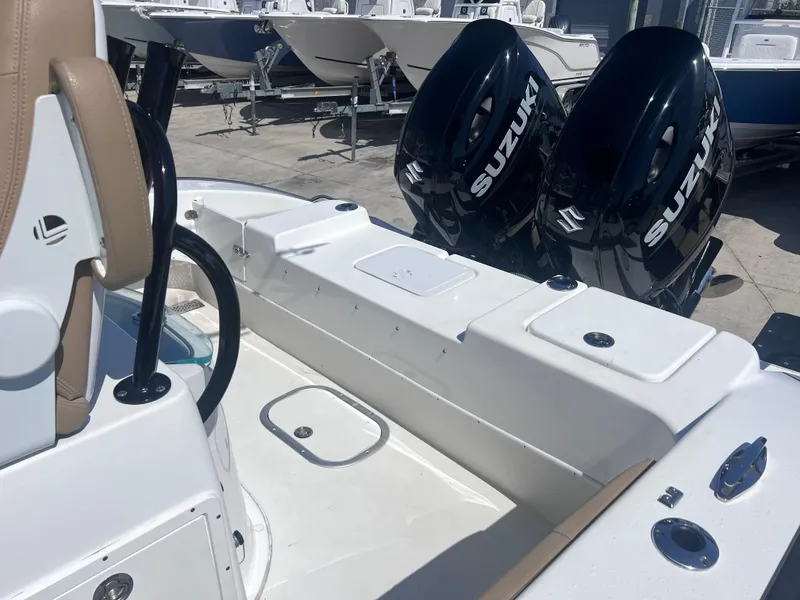 Slide: The Image of 2022 Cape Horn 24 XS boat with dual Suzuki outboard engines, interior view. - 39