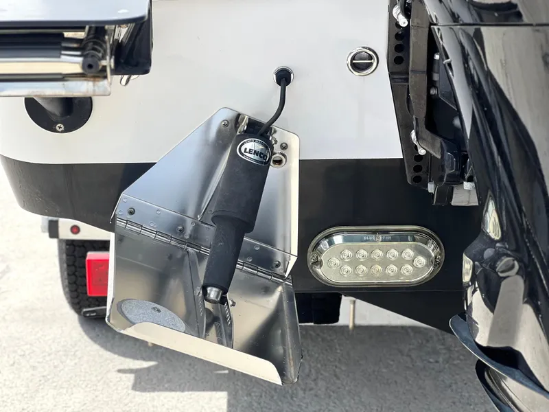 Slide: The Image of 2022 Cape Horn 24 XS boat with trim tab and LED light detail. - 4