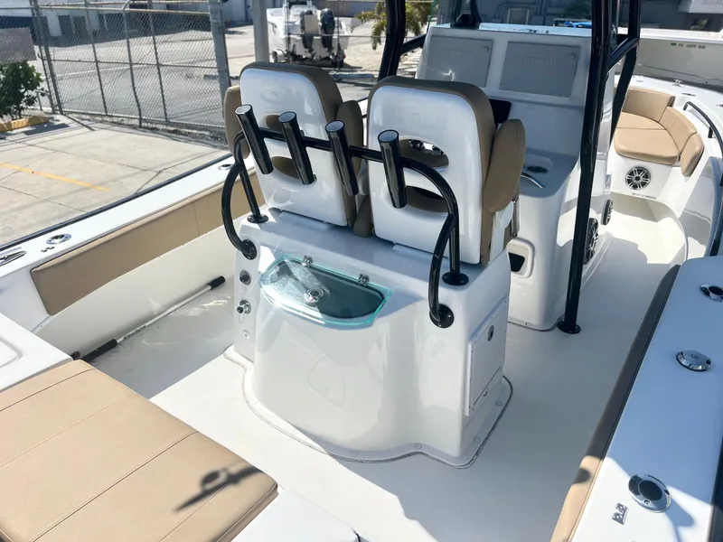 Slide: The Image of 2022 Cape Horn 24 XS boat interior with seating and control panel. - 45