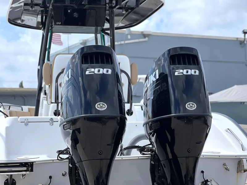 Slide: The Image of Twin Suzuki 200 engines on a 2022 Cape Horn 24 XS boat. - 7