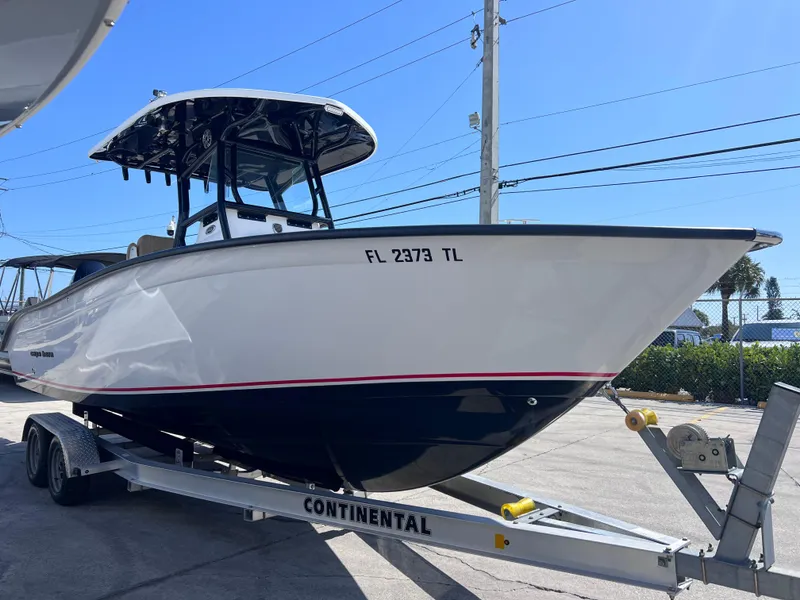 Slide: The Image of 2022 Cape Horn 24 XS boat on trailer, side view, sunny day. - 9