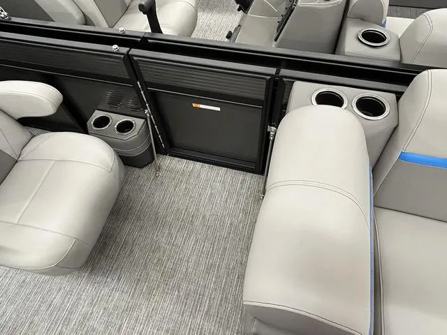 Slide: The Image of 2023 Qwest 822 RLS boat interior with gray seating and cup holders. - 6