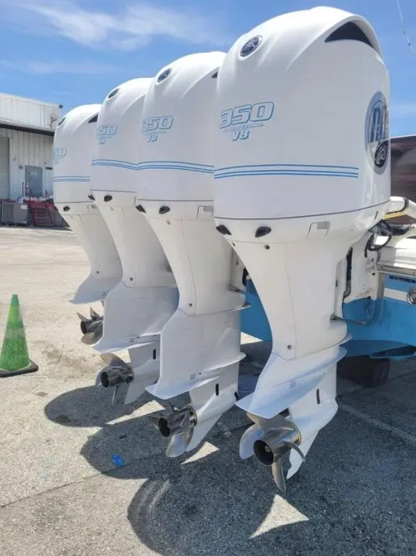 Slide: The Image of Four powerful outboard motors on a 2014 SeaHunter Tournament boat. - 3