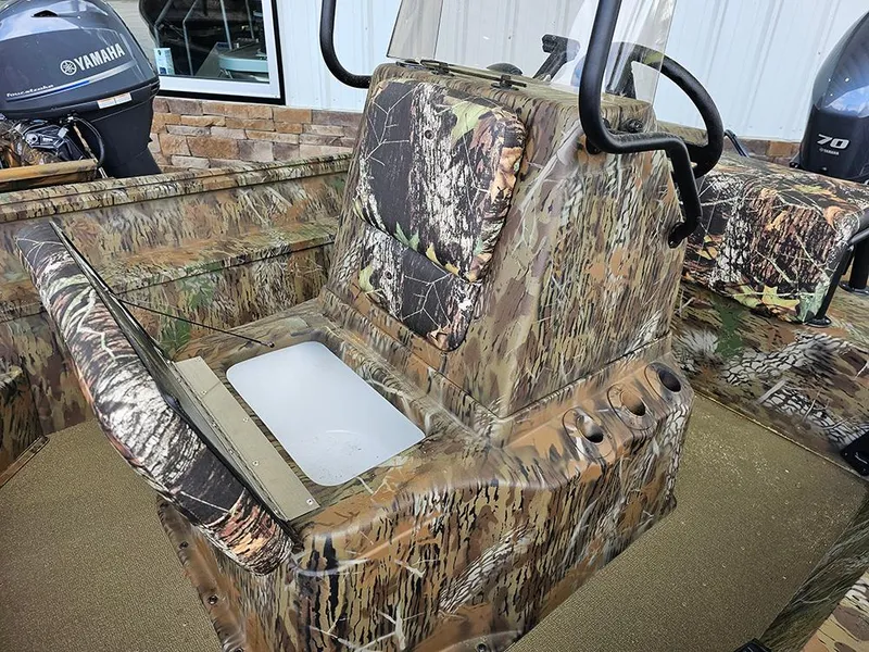 Slide: The Image of 2025 G3 Gator Tough 17 CC boat with camouflage seating and Yamaha motor. - 10