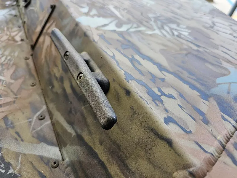 Slide: The Image of 2025 G3 Gator Tough 17 CC boat with camouflage pattern and cleat detail. - 15