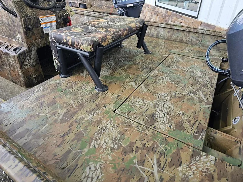 Slide: The Image of Camouflage interior of 2025 G3 Gator Tough 17 CC boat with bench seating. - 7