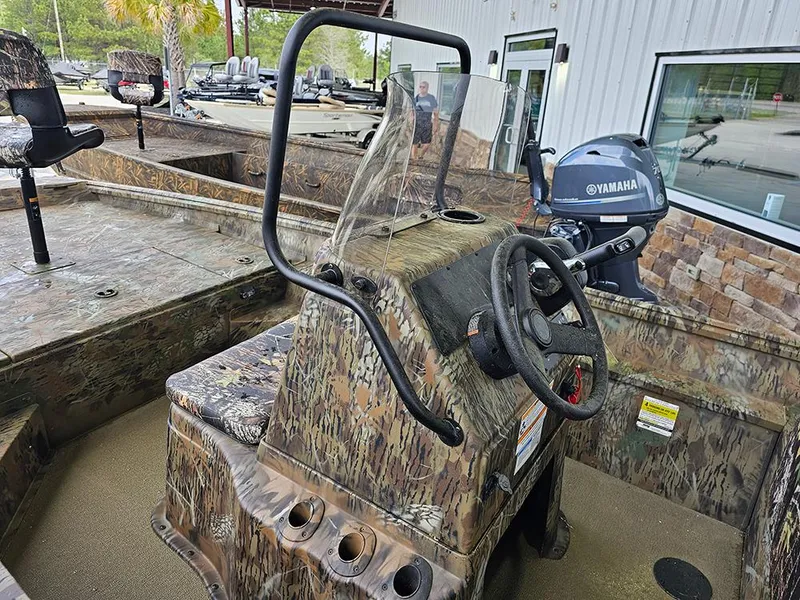 Slide: The Image of 2025 G3 Gator Tough 17 CC boat with camo design and Yamaha motor. - 8