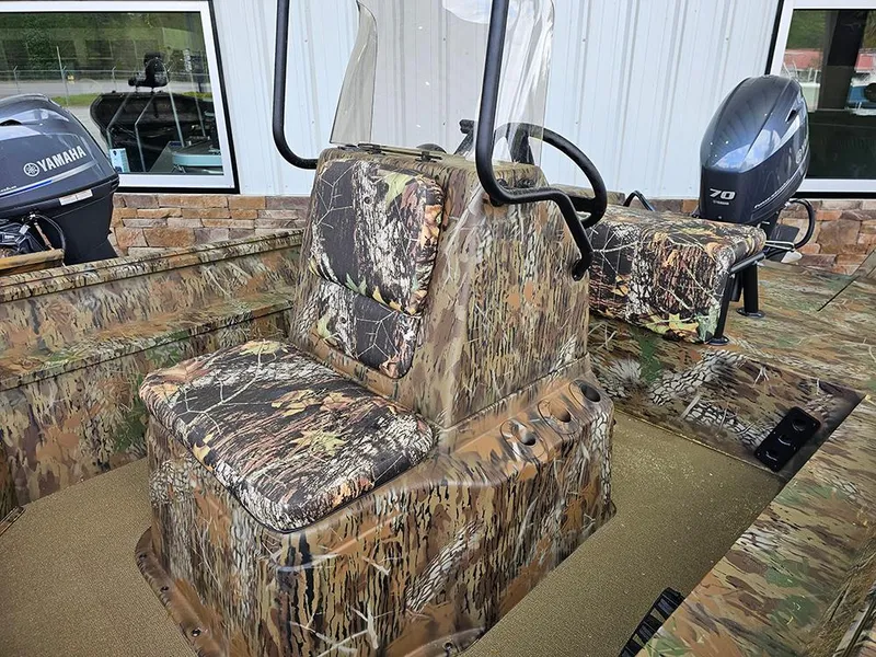 Slide: The Image of 2025 G3 Gator Tough 17 CC boat with camouflage seating and Yamaha motor. - 9