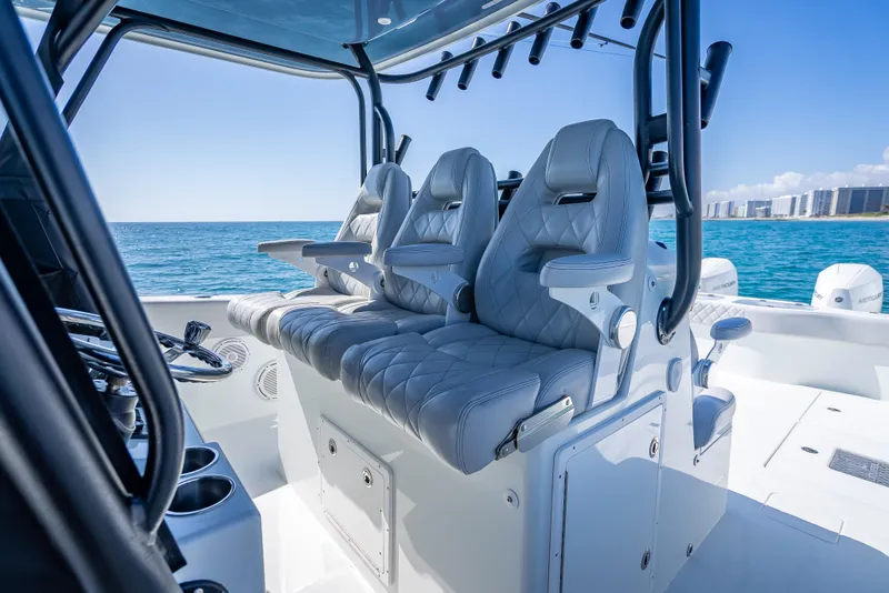 Slide: The Image of Luxurious interior of 2019 Freeman 42 LR boat with plush seating and ocean view. - 25