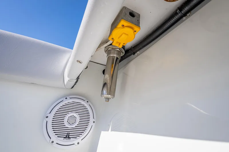 Slide: The Image of Speaker and metal fixture inside a 2019 Freeman 42 LR boat. - 38