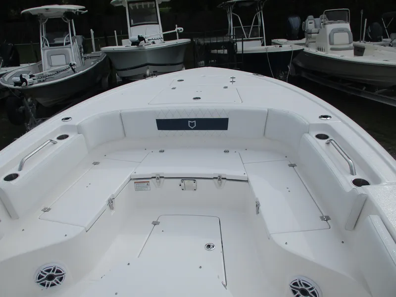 Slide: The Image of 2025 Sea Fox 282 Hybrid LT boat interior with seating and storage compartments. - 2