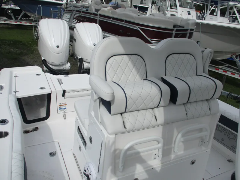 Slide: The Image of 2025 Sea Fox 282 Hybrid LT boat with dual engines and luxurious seating. - 4