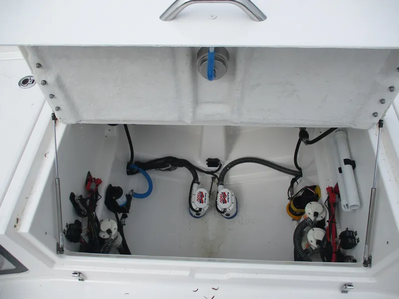 Slide: The Image of 2025 Sea Fox 282 Hybrid LT boat storage compartment with wiring and components. - 5