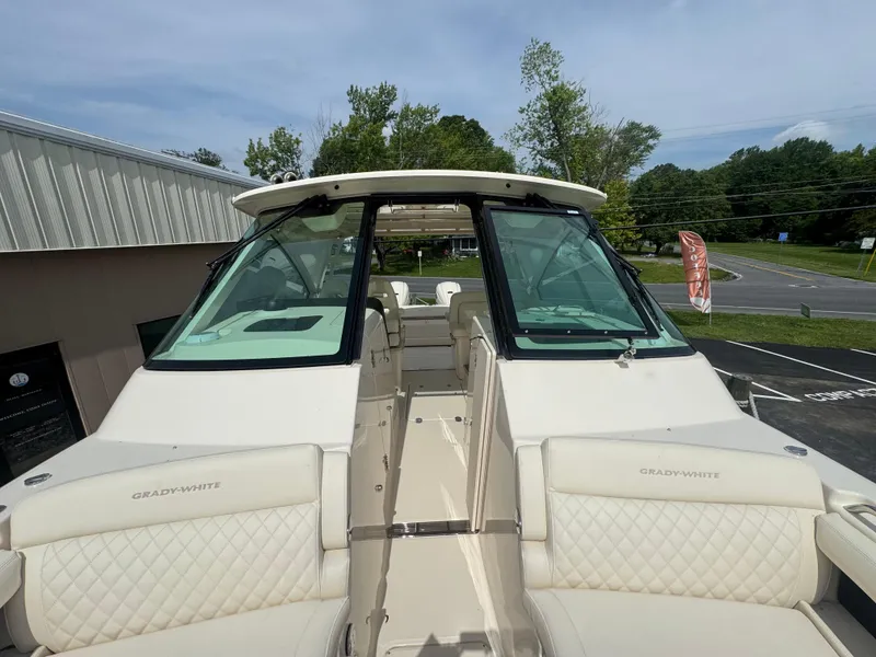 Slide: The Image of 2025 Grady-White 345 boat with sleek design and spacious seating. - 14