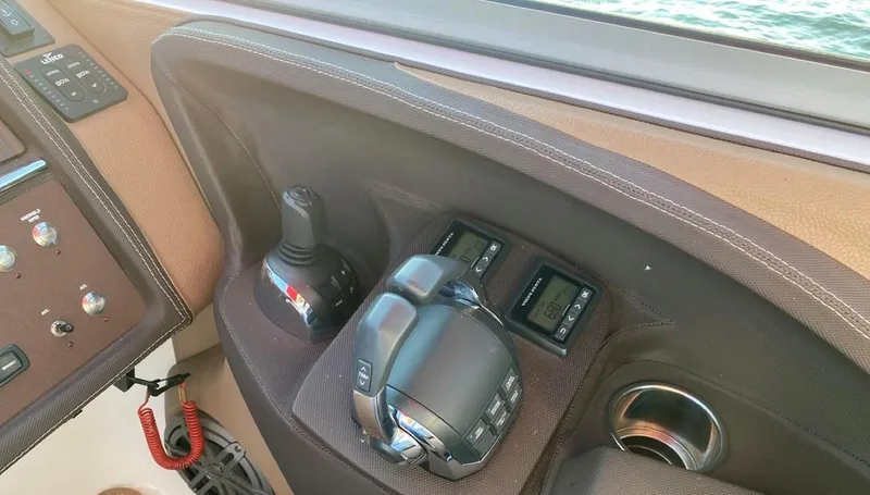 Slide: The Image of Control panel of a 2016 Cobalt 296 boat with joystick and throttle controls. - 7