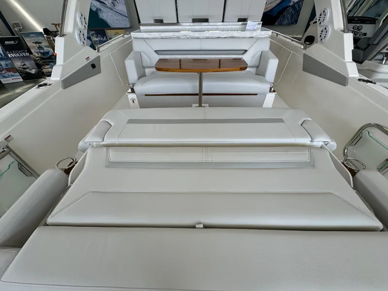 Slide: The Image of 2025 Tiara Yachts 34 LS interior with luxurious seating and table. - 20