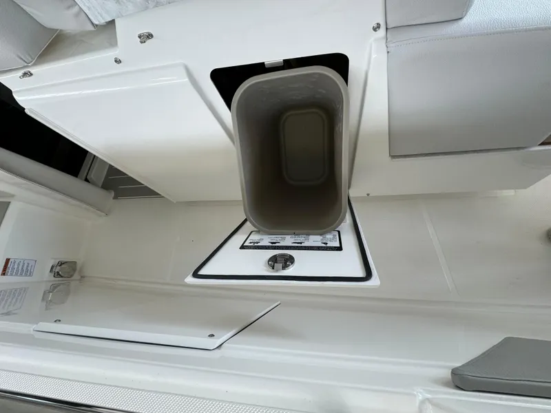 Slide: The Image of 2025 Tiara Yachts 34 LS interior detail, featuring a built-in storage compartment. - 22