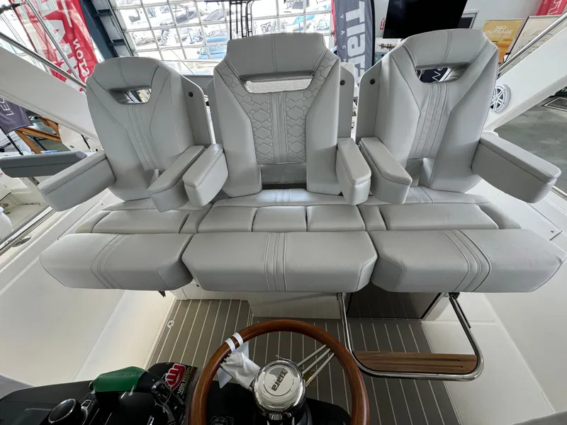 Slide: The Image of 2025 Tiara Yachts 34 LS interior with luxurious gray seating and modern design. - 26